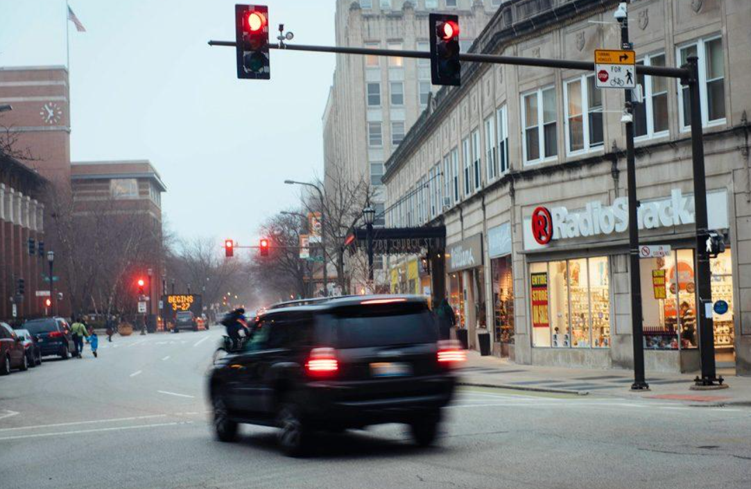 If my self-driving car runs a red light and causes an accident, who bears legal responsibility?